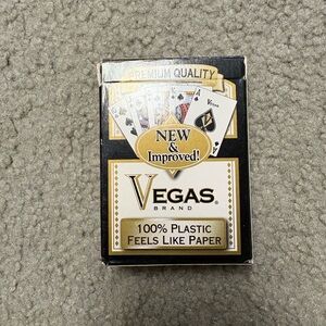 Lightly used black backed Vegas deck of playing cards